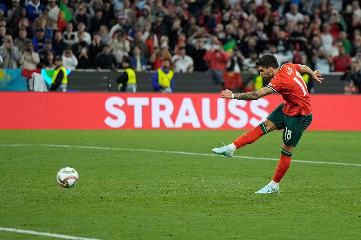 Ruben Neves scores a penalty for Portugal